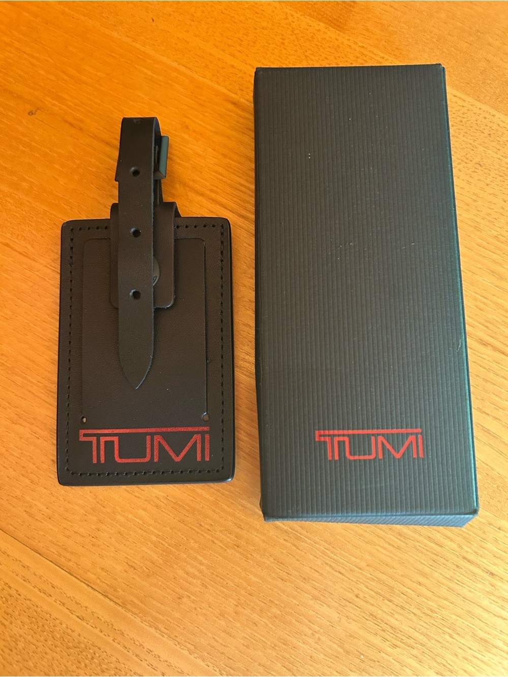TUMI Alpha Large Black Leather Luggage Tag with Red Logo